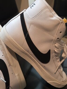 Nike White and Black High-Top Sneakers with Yellow Tongue Accent